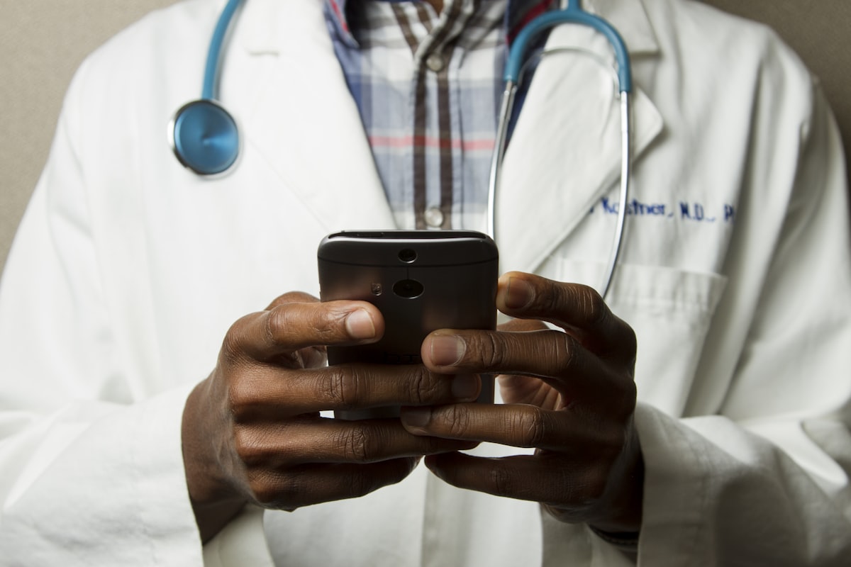 Doctor using mobile phone